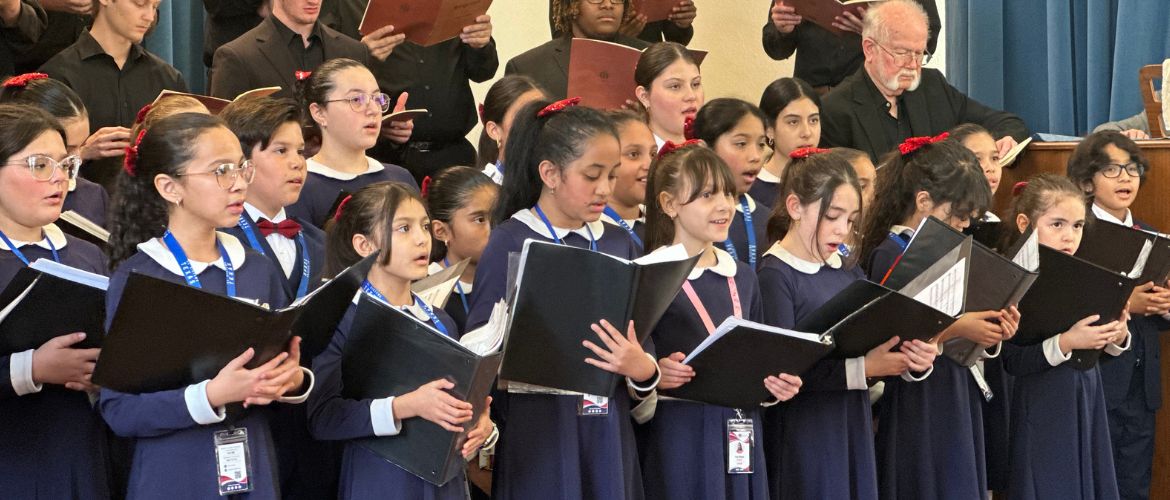 Children sing in a choir.